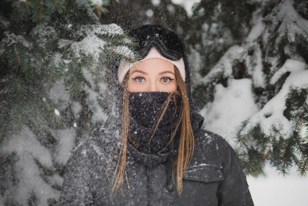 Cross-country skier demonstrates layering technique for optimal warmth and flexibility in varying weather conditions